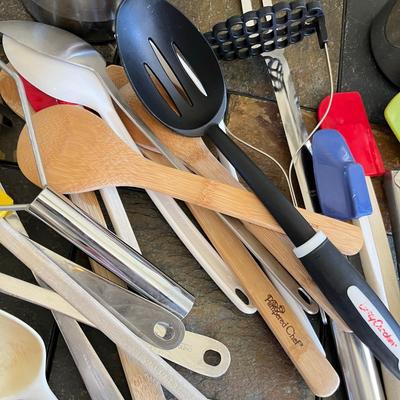 Two jars of kitchen utensils