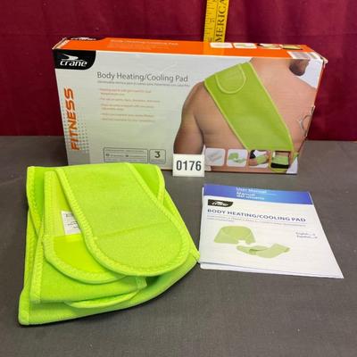 Body heating and cooling pad