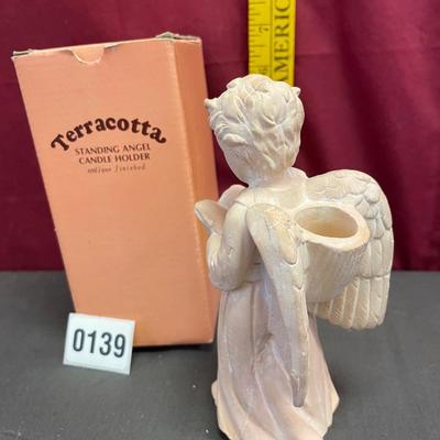 Terra cotta Angel with candle holder