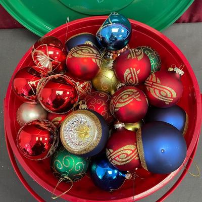 Holiday bulbs in a round storage