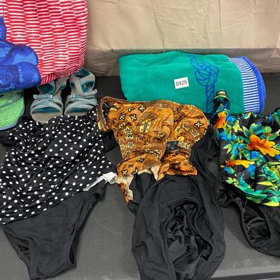 Swimming suits size 10,12 and 14