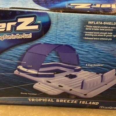 Inflatable tropical breeze float.