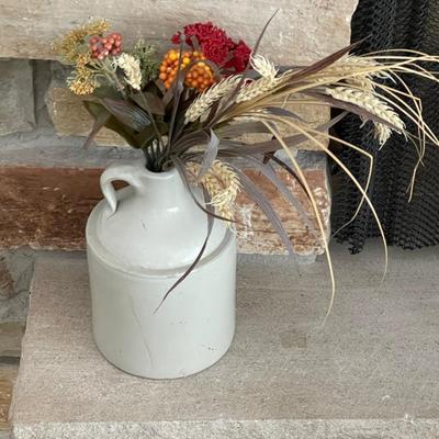 Moonshine jug with flowers