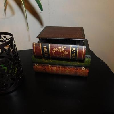 HIDDEN BOOK BOX, BUD VASE WITH FOLIAGE, AND CANDLE HOLDER