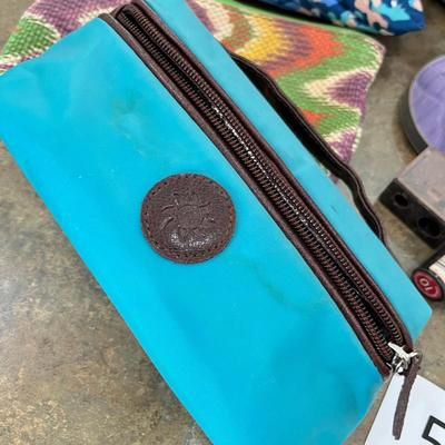 Lot of makeup and makeup bags