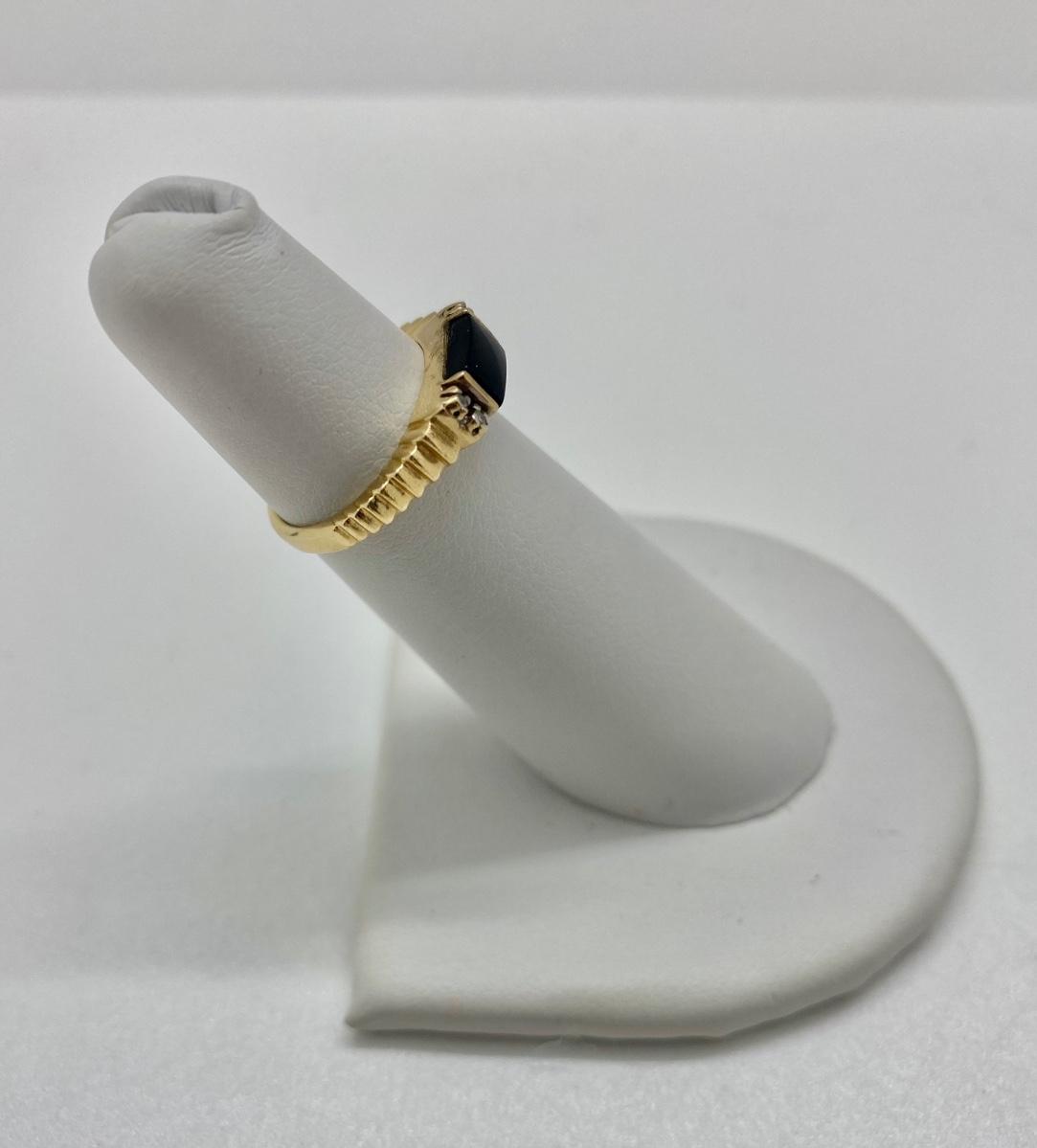 154J: 14K Onyx and Diamond Pinky Ring 2.38G | EstateSales.org