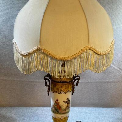 Antique Porcelain and Brass Lamp with Fringe Shade Musician Playing to 2 women.