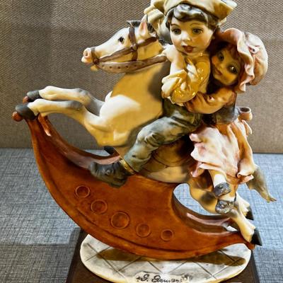 Giuseppe Armani  Sculpture of Children on a Rocking Horse
