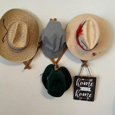 Selection of hats and hanger