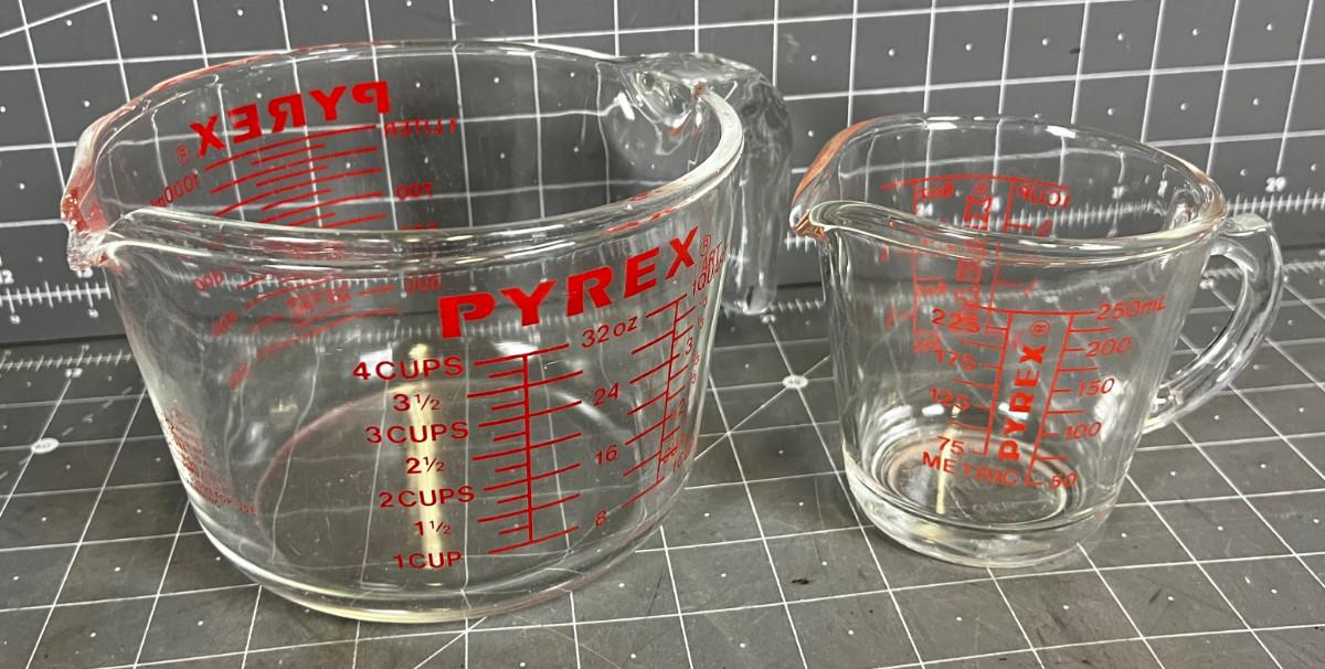 2 Pyrex Measuring Cups