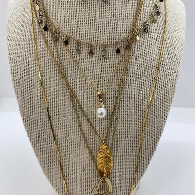 LOT 38: Five Gold Tone Necklaces & Two Gold Tone Bracelets