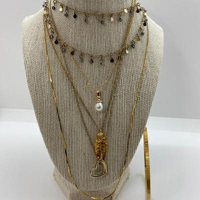LOT 38: Five Gold Tone Necklaces & Two Gold Tone Bracelets