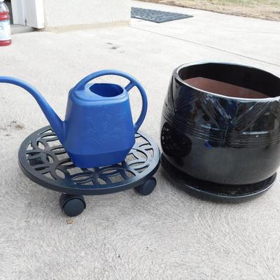 IRON PLANT CADDY, CLAY POTS AND A WATERING CAN