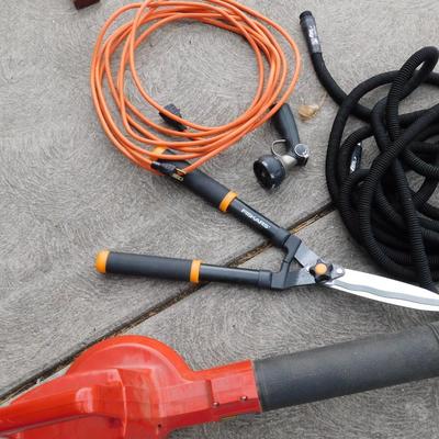 CRAFTSMAN ELECTRIC LEAF BLOWER, EXTENSION CORD, GARDEN HOSE, SPRAYER, AND HEDGE TRIMMERS