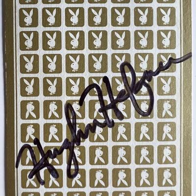 Hugh Hefner signed playing card. GFA authenticated