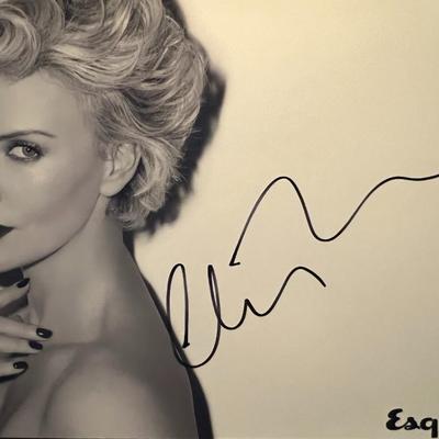 Charlize Theron signed photo
