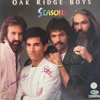 Oak Ridge Boys Seasons signed album. GFA authenticated