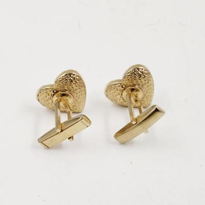GOLD TONED HEART SHAPE CUFF LINKS