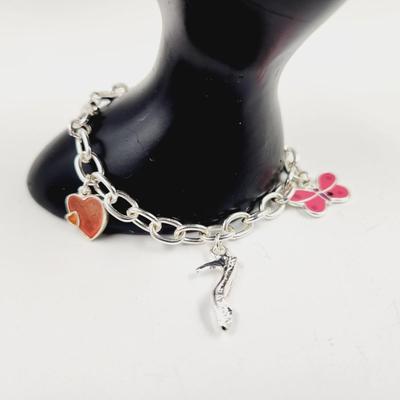 SILVER TONED SUMMER TIME CHARM BRACELET