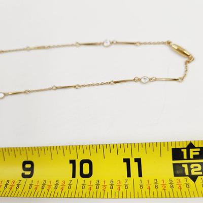 GOLD TONED & CRYSTAL NECKLACE