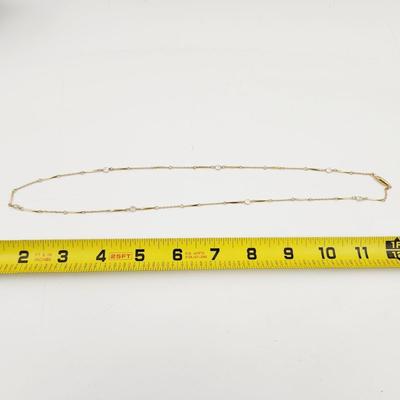 GOLD TONED & CRYSTAL NECKLACE