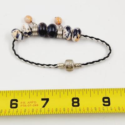 PANDORA STYLE BLACK, ORANGE & WHITE BRACELET