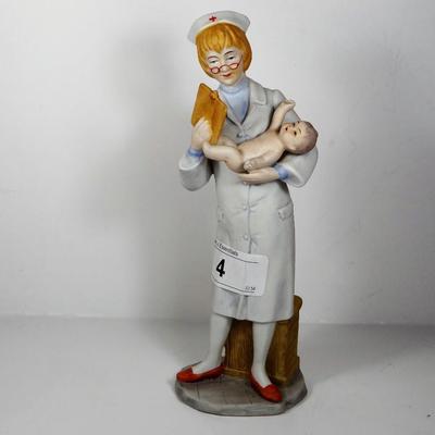 CapodimonteÂ Nurse Holding Baby Figurine
