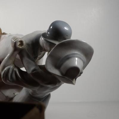 Kissing Goodbye Porcelain Figurine