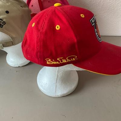 And assortment of five baseball caps