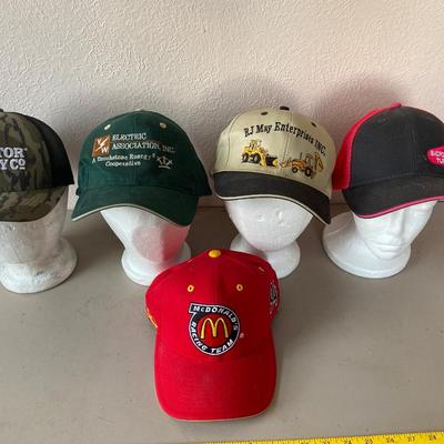 And assortment of five baseball caps