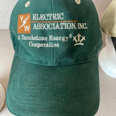 And assortment of five baseball caps