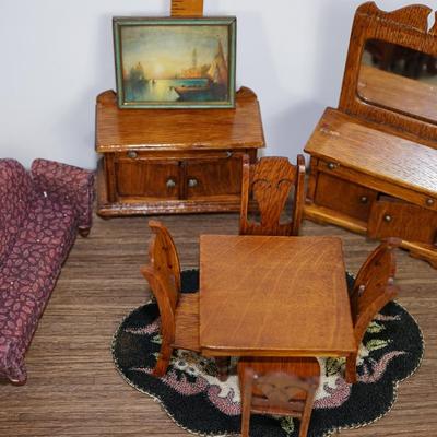 MINIATURE GROUPING OF A 1920'S DINING ROOM OAK FURNITURE , SOFA AND TABLE AND CHAIRS