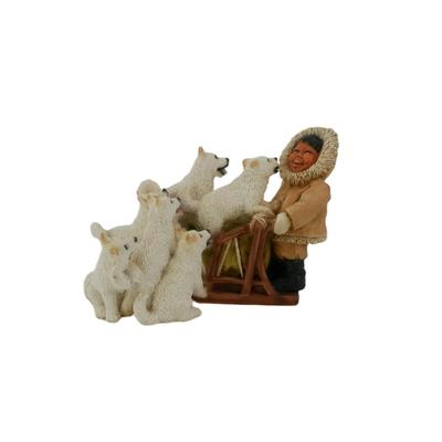 Vintage Laughing Eskimo with Dogs Figurine 