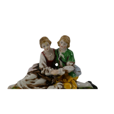 Couple with Dog Figurine