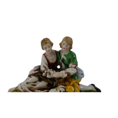 Couple with Dog Figurine