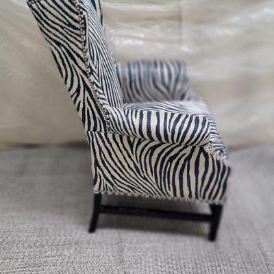 Zebra polished line wing chairs $815 each (pair avail) side view 
H43"  W32"  D32"