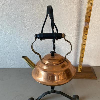 Copper tea pot with wrought iron stand