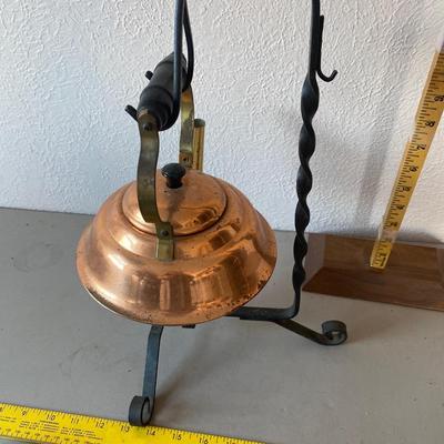 Copper tea pot with wrought iron stand