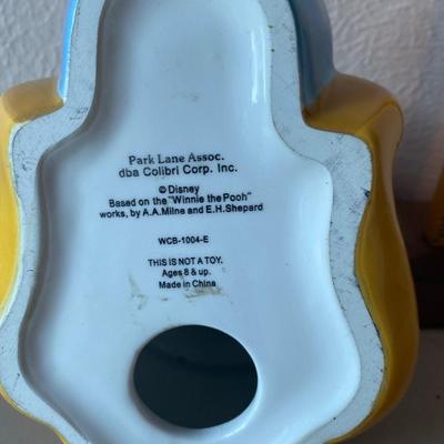 Winnie the Pooh bank, and picture holder