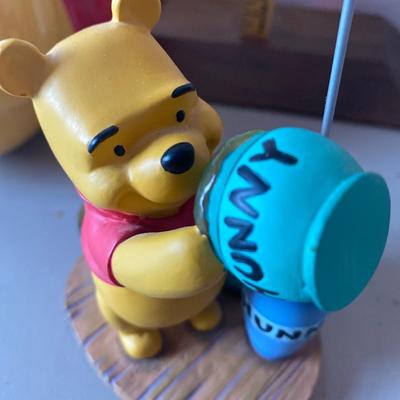 Winnie the Pooh bank, and picture holder