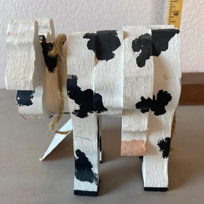 Wood cow figurine