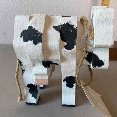 Wood cow figurine