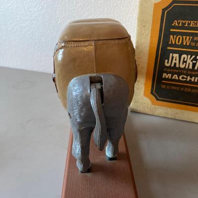 Novelty, jackass cigarette, dispensing machine