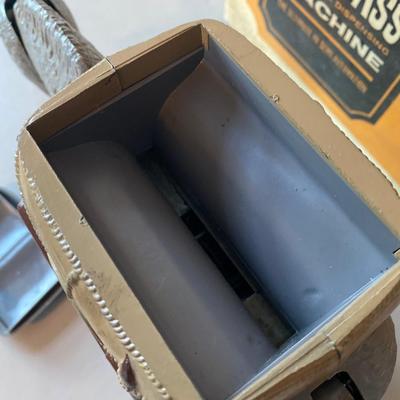 Novelty, jackass cigarette, dispensing machine