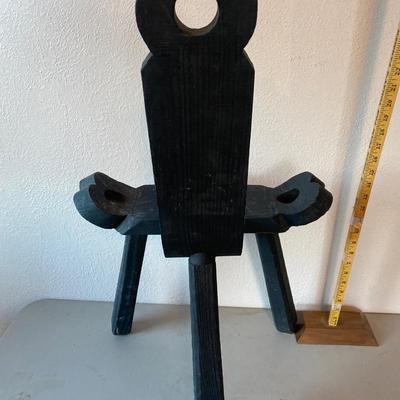 Vintage wooden three legged chair