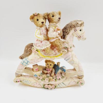 CUTE PINK RESIN TEDDYS ON A ROCKING HORSE COLLECTABLE