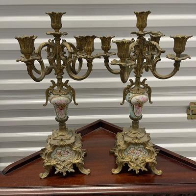 2 vintage brass candelabras.  Porcelain design on front. 18â€ high.