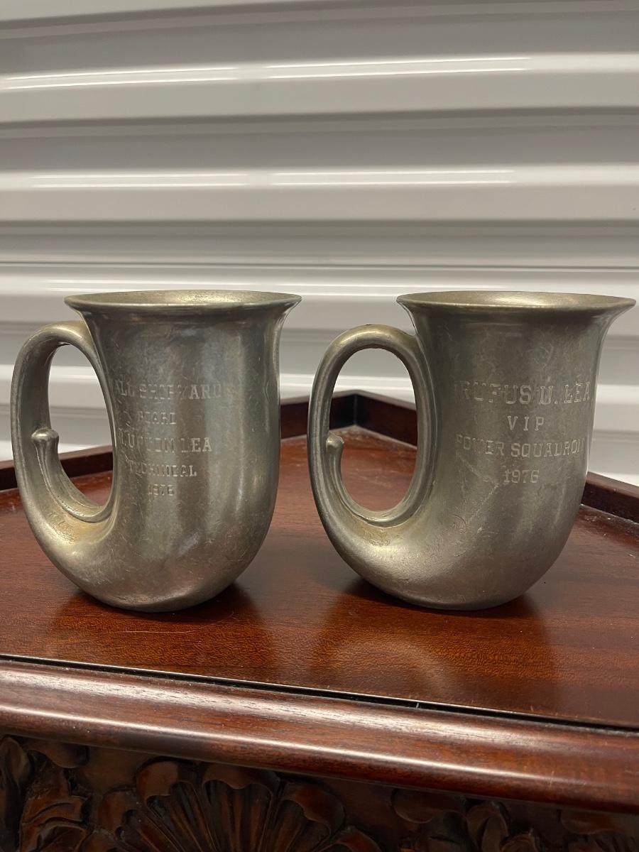 Two vintage pewter mugs with engraving. 5” high.