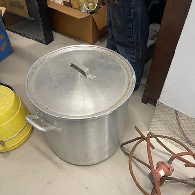 Large seafood boiling pot  includes stainer basket, large metal stirrer, and 2 ladles. Also includes burner.  21” high.