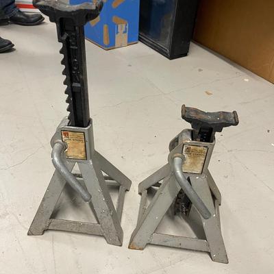 2 Jack stands.  Each extends to approx 18”.